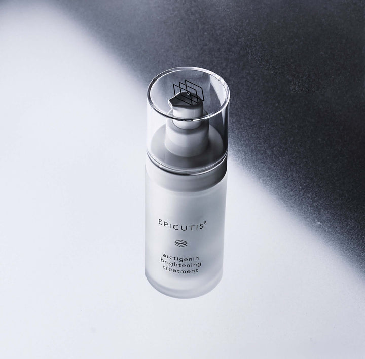 Arctigenin Brightening Treatment bottle with a sleek design on a gradient background.