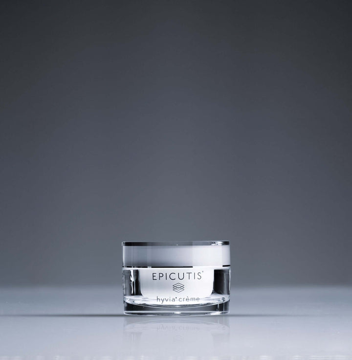 Hyvia® Crème by Epicutis, showcasing its rich treatment formula in a sleek glass jar.