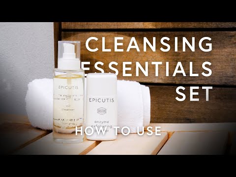 Cleansing Essentials Epicutis Set featuring oil cleanser and enzyme exfoliating powder on a wooden table.